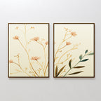 The Autumn Botanicals - Set of 2 features framed canvas prints with minimalist light brown and green autumn botanical illustrations on a light beige background, displayed side by side on a white wall.