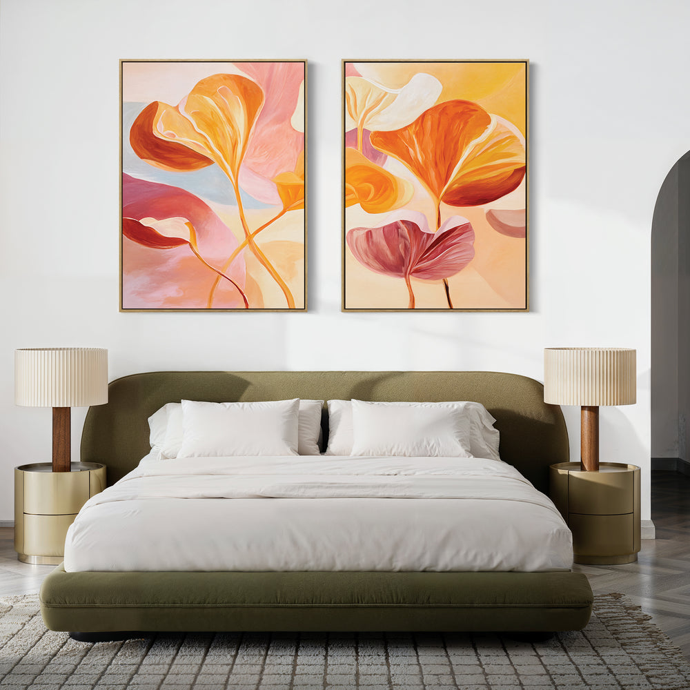 A modern bedroom featuring a green upholstered bed, white bedding, two gold nightstands with beige lamps, and the "Autumn Reverie - Set of 2" botanical wall art displayed above the headboard.