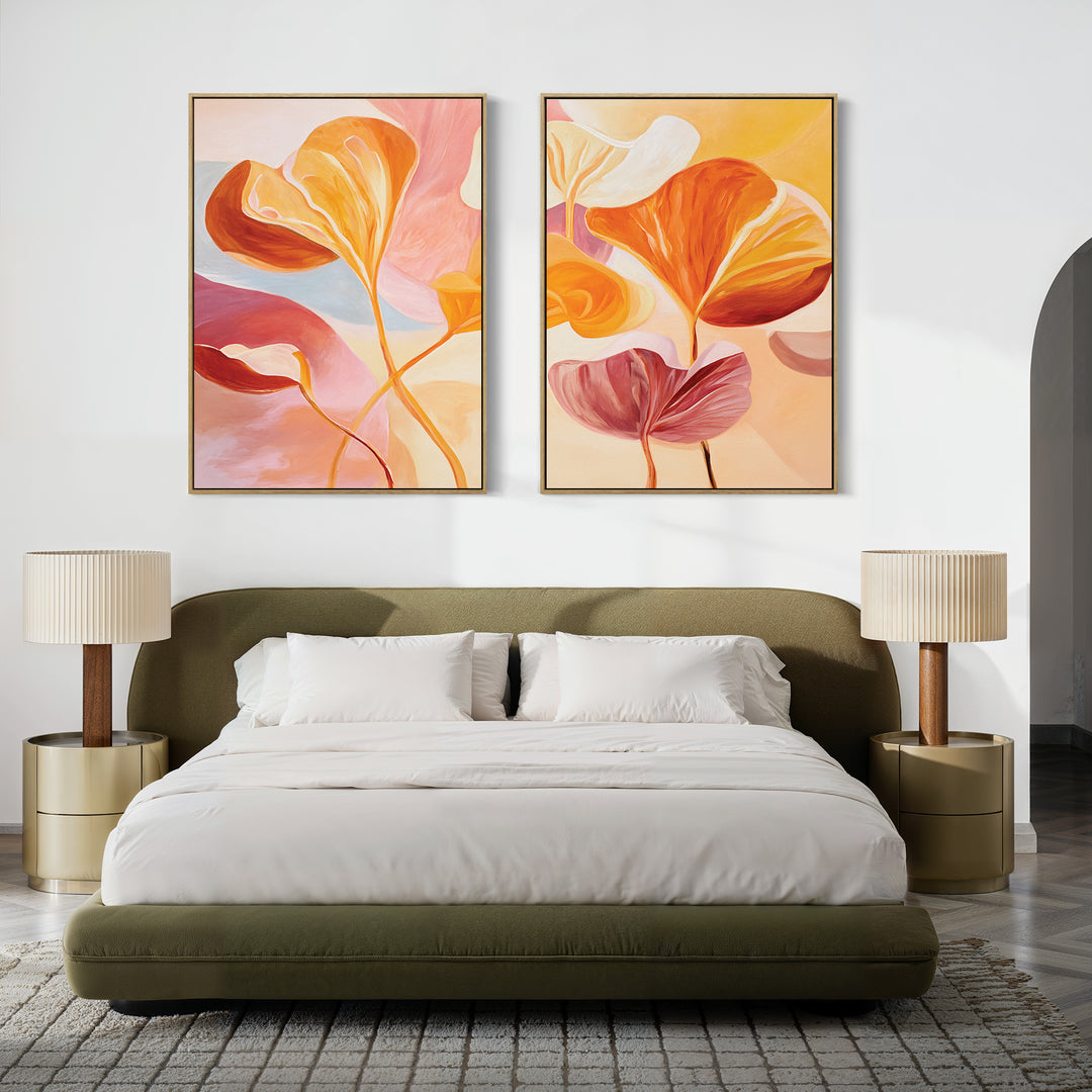 A modern bedroom featuring a green upholstered bed, white bedding, two gold nightstands with beige lamps, and the "Autumn Reverie - Set of 2" botanical wall art displayed above the headboard.