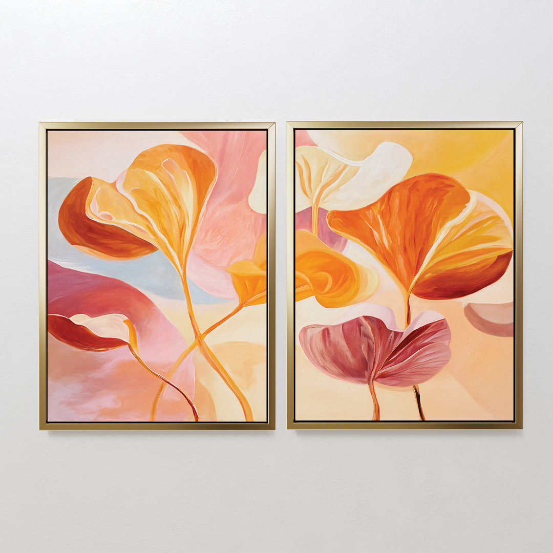 The "Autumn Reverie - Set of 2" features framed abstract paintings with flowing leaves in warm orange, pink, yellow, and cream—ideal botanical wall art to add a floral touch to your home decor.