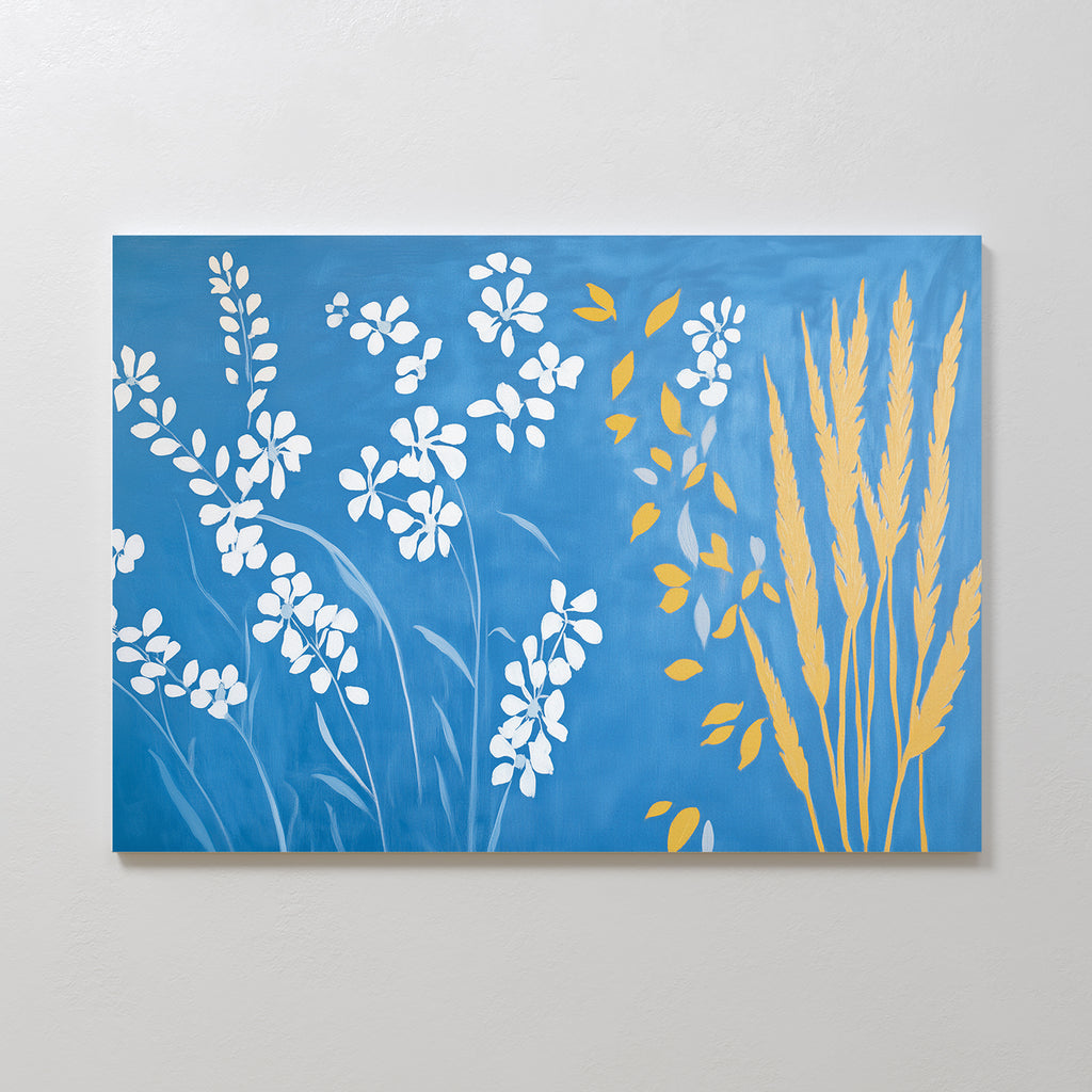 Azure Meadow Canvas Art - Horizontal features white floral silhouettes on the left and yellow wheat-like plants on the right, set against a blue background—a perfect botanical wall art accent for your space.