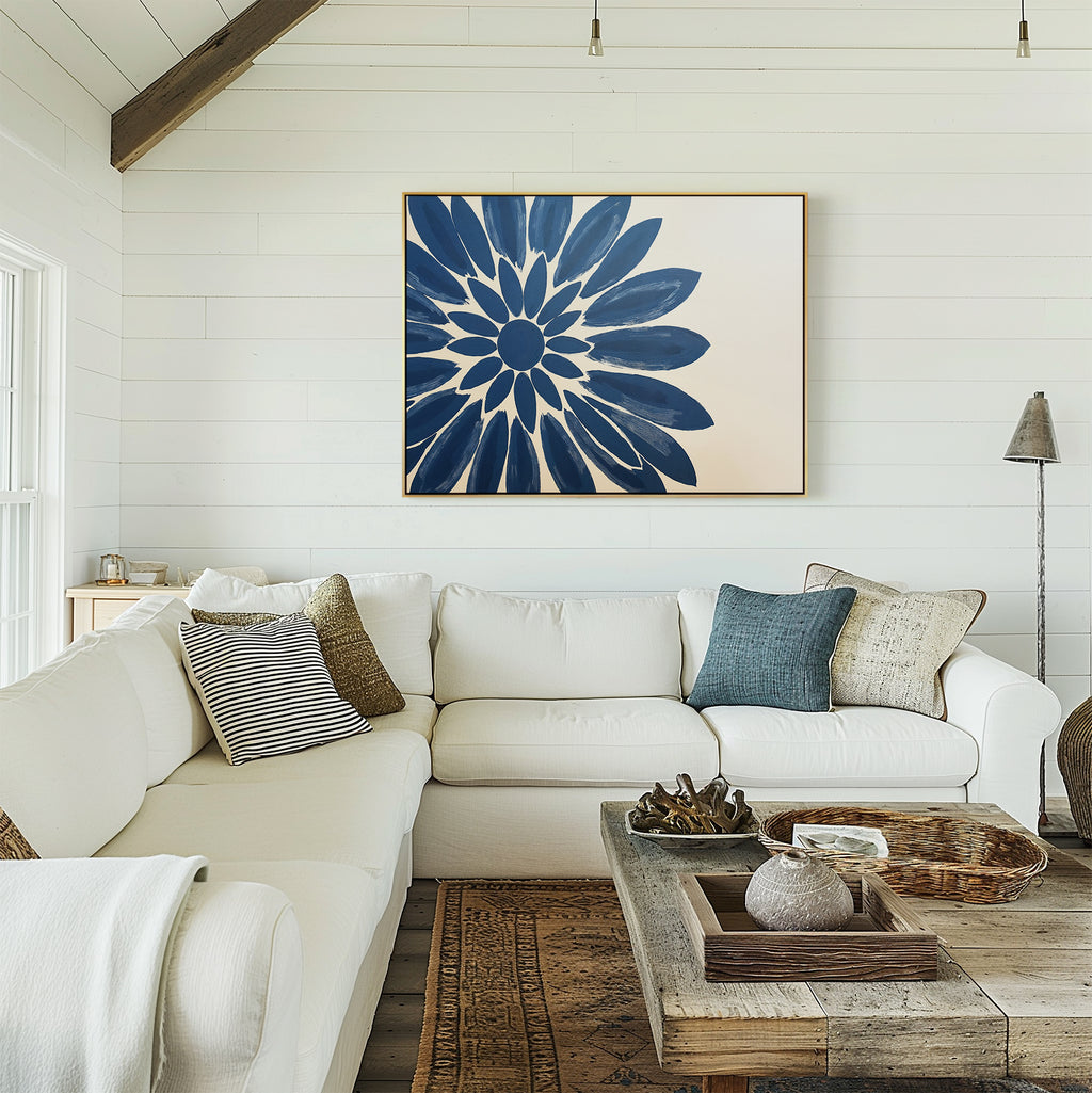 A cozy living room features a white sectional, blue and neutral pillows, a rustic wood coffee table, and the Azure Radiance Canvas Art - Horizontal on a shiplap wall. Natural light streams in, creating the perfect modern decor vibe.