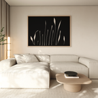 A modern living room with a light beige sectional, a low wooden coffee table with books and a bowl, and striking Botanical Silhouettes Abstract Canvas Art. Soft natural light fills the space.