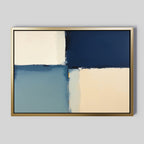 Blue Quarters Canvas Art - Horizontal features four rectangular blocks in pale cream, navy blue, and muted blue with soft edges. This contemporary geometric print comes in a gold frame—ideal for adding sophistication to a modern living room with light gray walls.