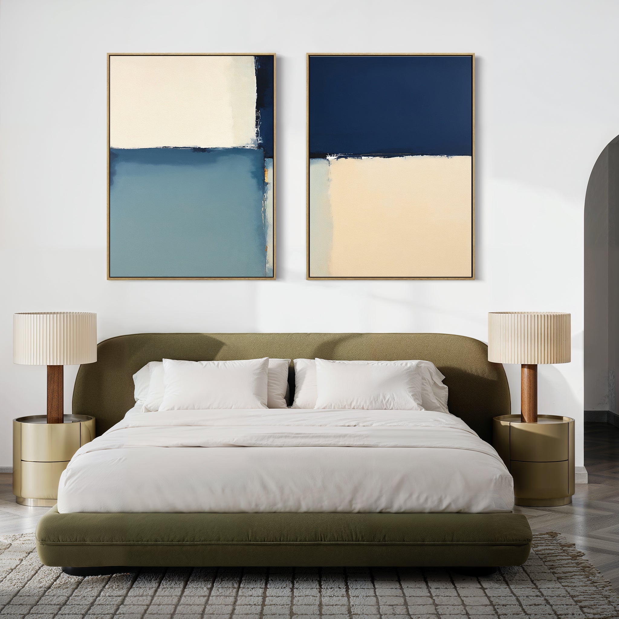 A modern bedroom with a green upholstered bed, white bedding, round nightstands with beige lamps, and the "Blue Quarters - Set Of 2" geometric paintings above the headboard—ideal inspiration for modern living spaces.