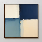 Blue Quarters Canvas Art - Square features a geometric abstract design with off-white, navy, muted blue, and cream blocks. This contemporary piece is ideal for modern living rooms and comes framed in wood.
