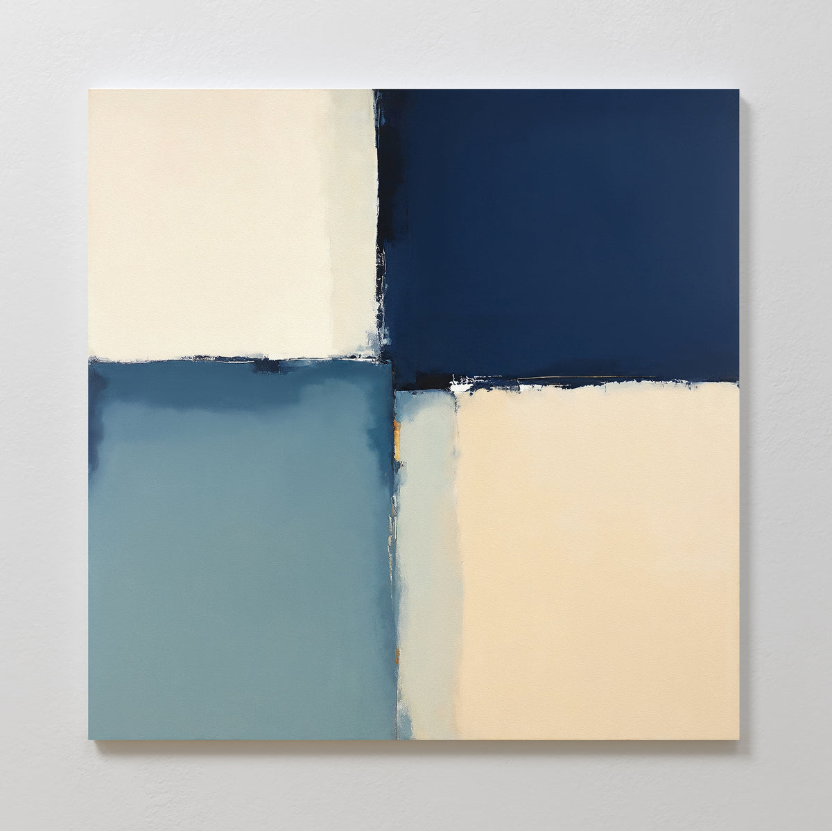 The Blue Quarters Canvas Art - Square showcases four large color blocks—cream, navy blue, and light blue—with softly blended edges, creating a bold geometric centerpiece ideal for modern living spaces.