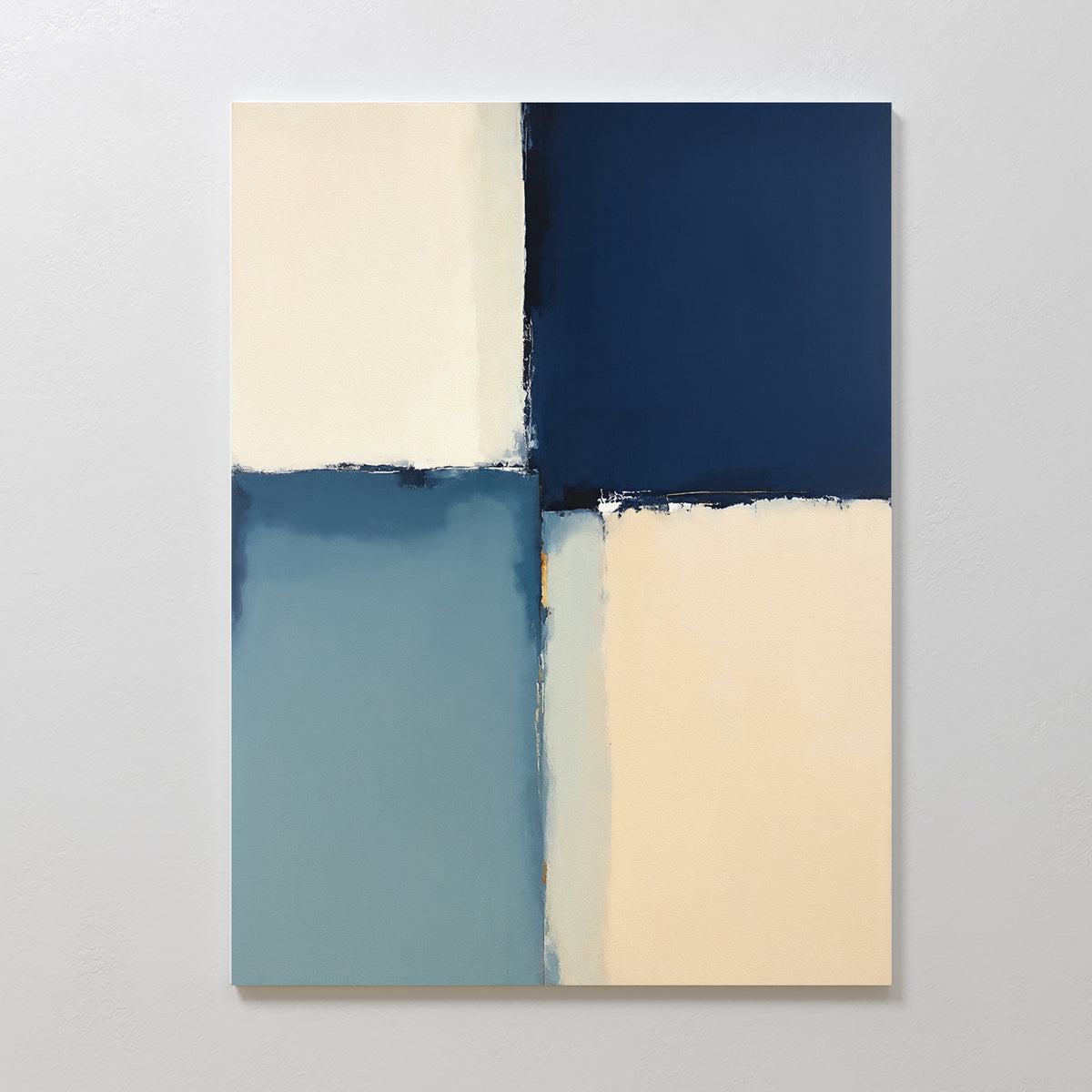 Blue Quarters Canvas Art - Vertical showcases four rectangles—cream, dark blue, teal, and beige—in a geometric design with soft, blurred edges. Displayed on a light gray wall, it adds a modern touch to any living room.