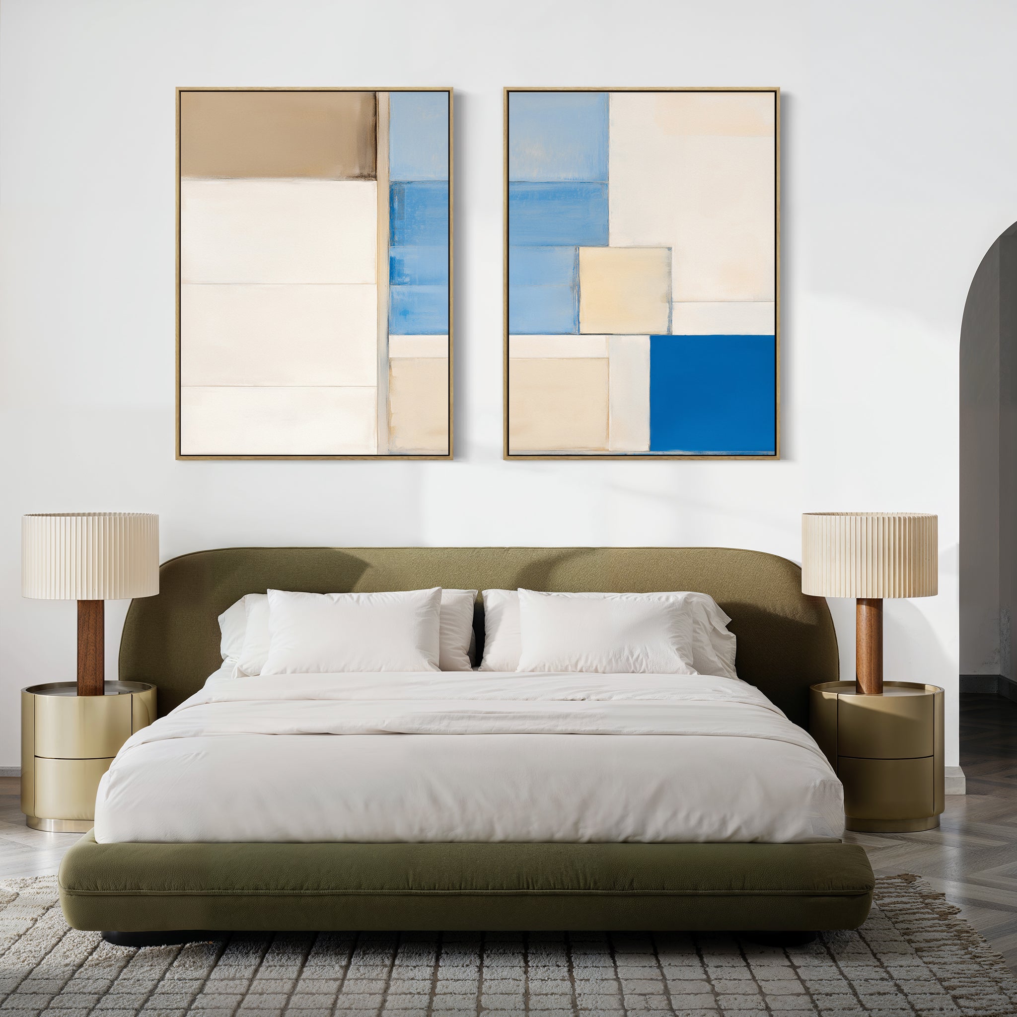 A modern bedroom with an olive green bed, white bedding, two round beige nightstands with matching lamps, and the Blue Tiles Composition - Set Of 2 wall art in beige and blue tones above the bed.