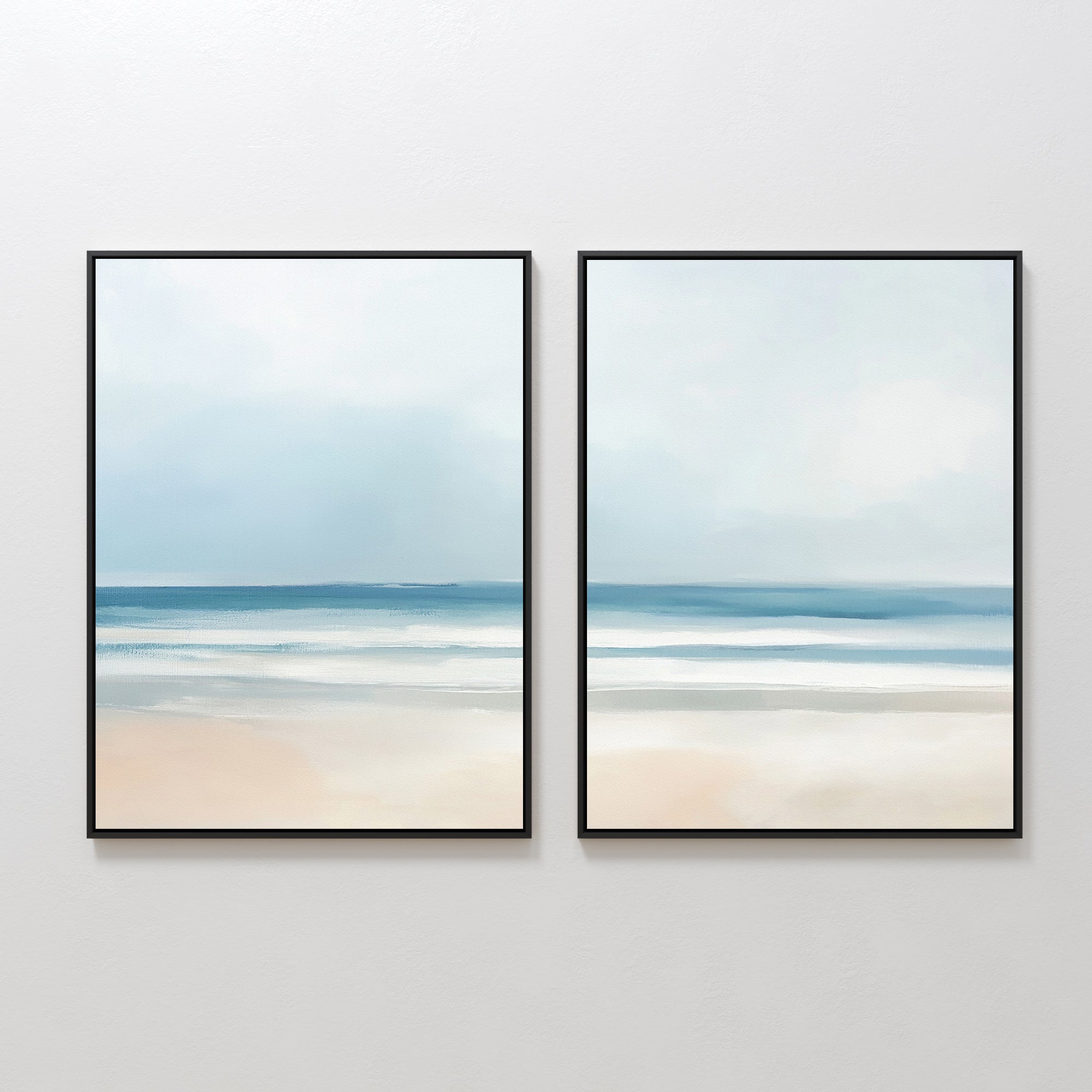 The Blurred Beach Scene - Set Of 2 features framed prints of a tranquil beach with soft blue water and sandy shores under a light, cloudy sky, perfect for adding serene coastal wall art to your space.