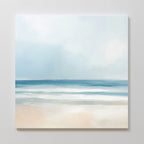 The Blurred Beach Scene Canvas Art - Square features a minimalist coastal design with soft blue, white, and beige tones depicting a tranquil beach—perfect as serene wall art.