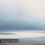 The Blurred Seascape Canvas Art - Square features soft, abstract shades of blue, white, and brown for a tranquil seascape look. "Zoomed In Detail" text appears in the lower left corner.