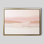 The Blush Mesa Canvas Art - Horizontal showcases a minimalist abstract landscape in soft pink, beige, and white tones. A gold frame with a black inner border enhances the serene design, adding a touch of elegance to your space.