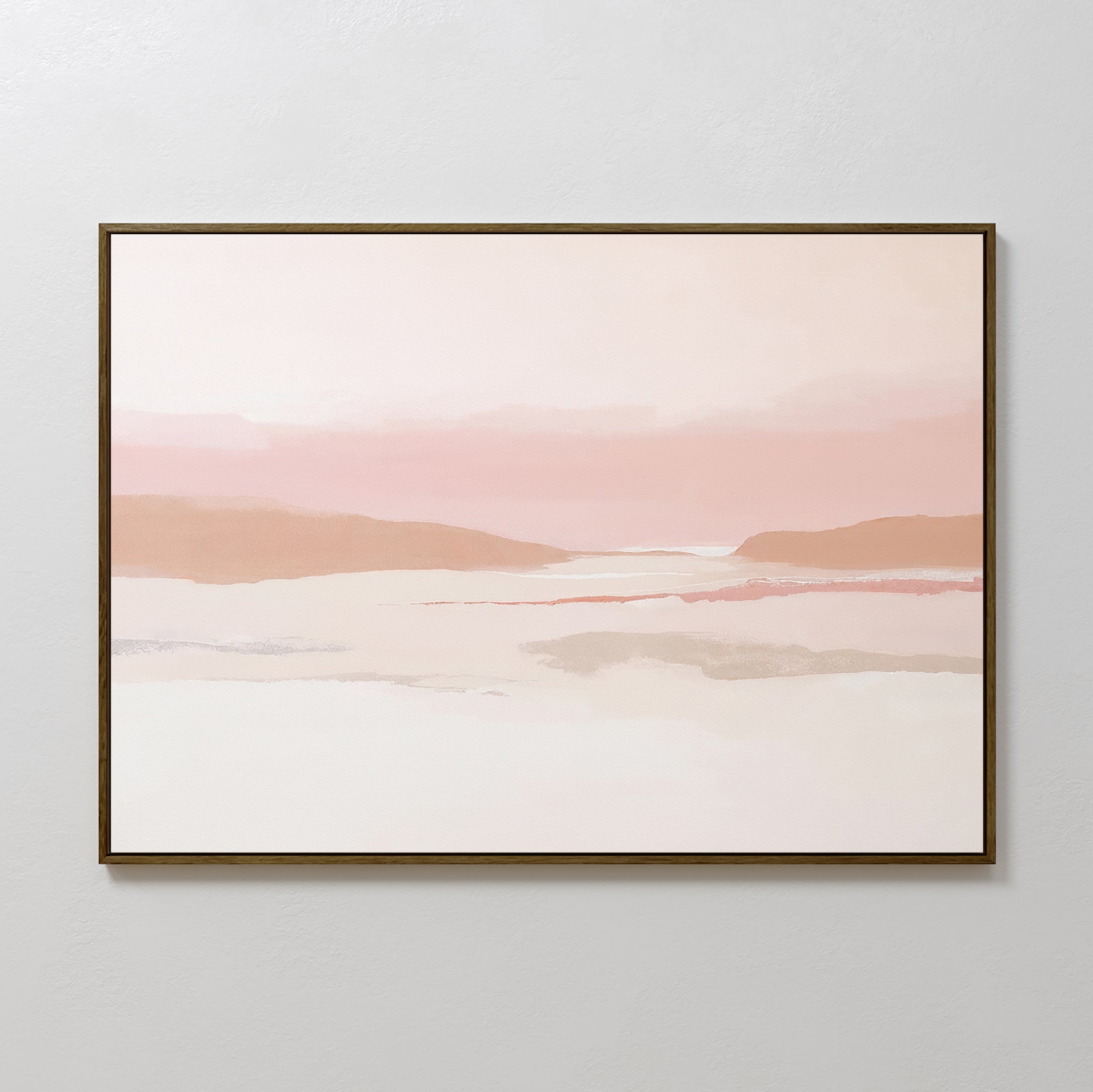 Blush Mesa Canvas Art - Horizontal features a serene landscape in soft pink, peach, and beige earth tones, with hills and calm water—perfect minimalist decor for a light wall, elegantly framed in a simple dark frame.