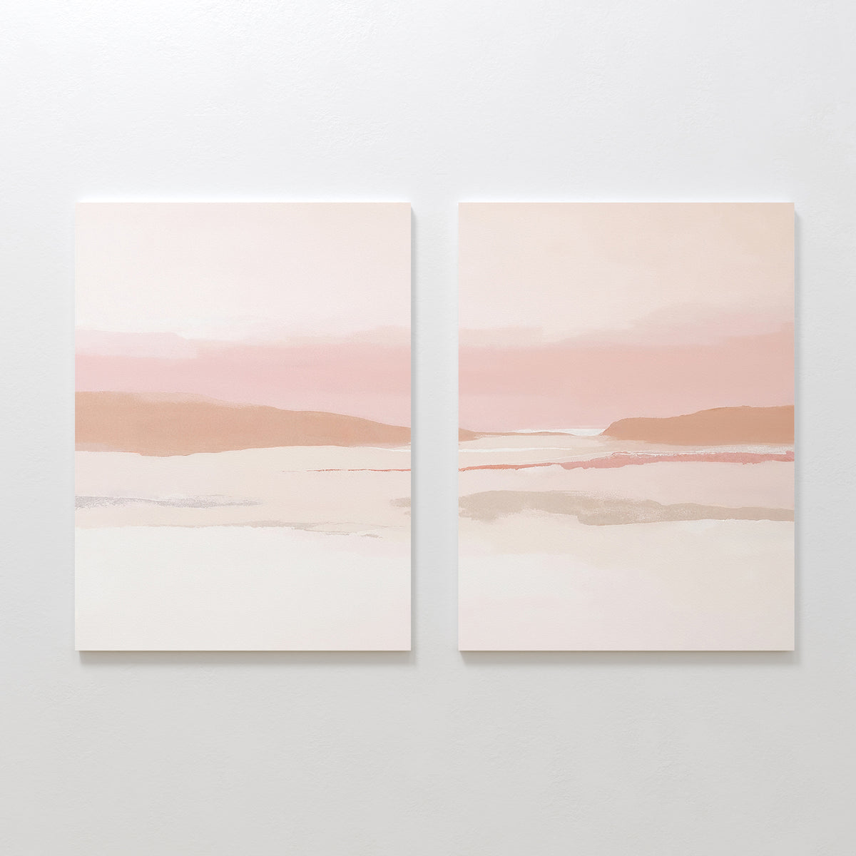 Blush Mesa - Set Of 2: Minimalist wall art pair with soft pink, beige, and white tones. Abstract landscapes suggest a serene seascape or horizon under a pastel sky, featuring simple designs and smooth color transitions.