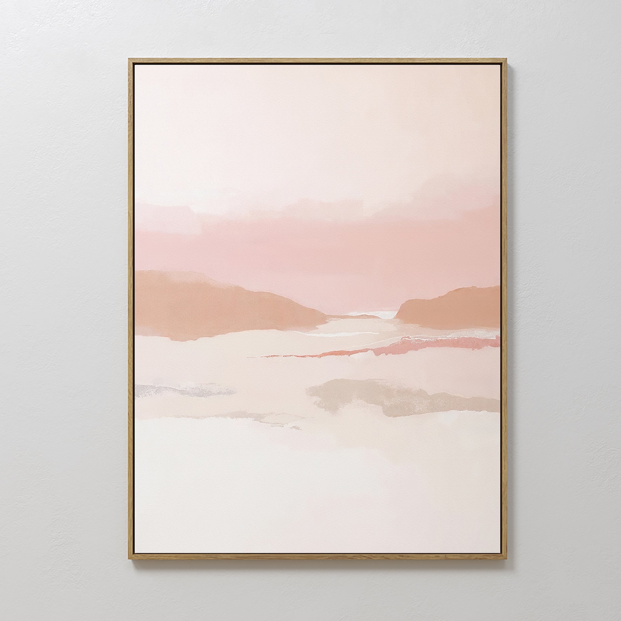 The Blush Mesa Canvas Art - Vertical features soft, blended shades of pink, white, and beige for a serene abstract look. This minimalist wall art in gentle earth tones is displayed on a light gray wall.