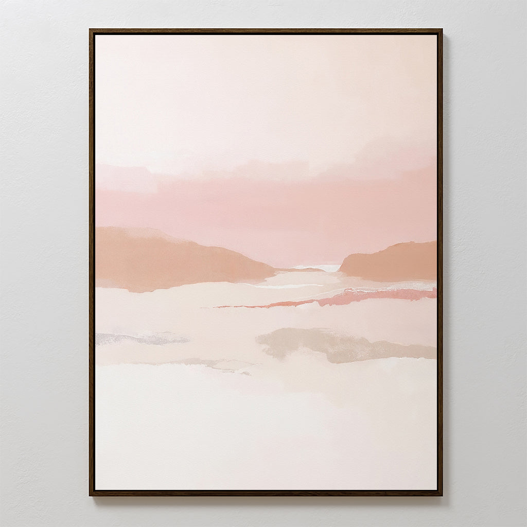 The Blush Mesa Canvas Art - Vertical showcases a minimalist landscape in pastel pink, peach, and beige tones with abstract hills under a cloudy sky, simply framed in dark wood and perfect for light-colored walls.