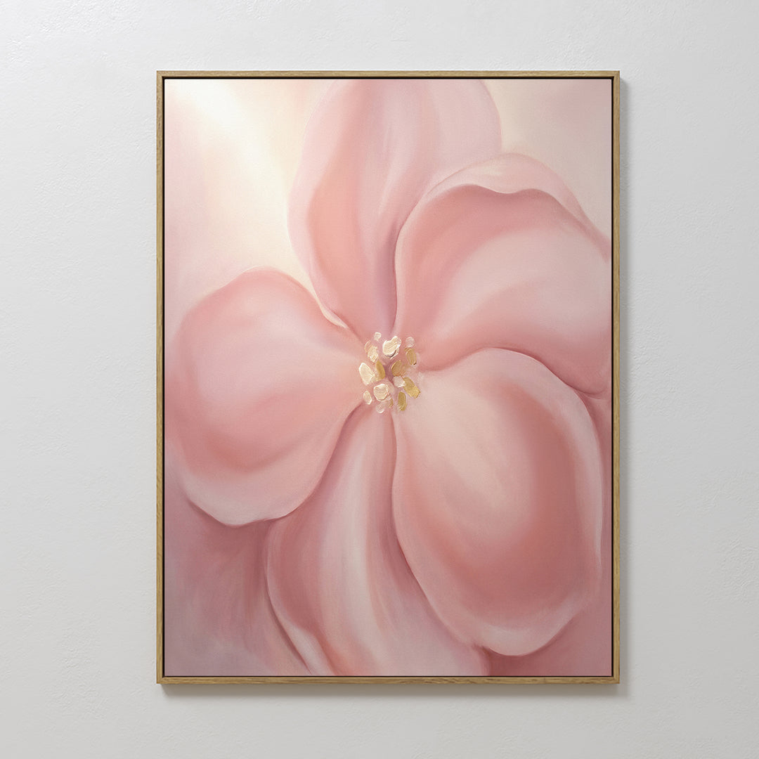 The Blushing Magnolia Canvas Art - Vertical displays a soft pink magnolia with five petals and a yellow center on a gentle background, creating delicate, dreamy wall art that adds romantic charm to any space.