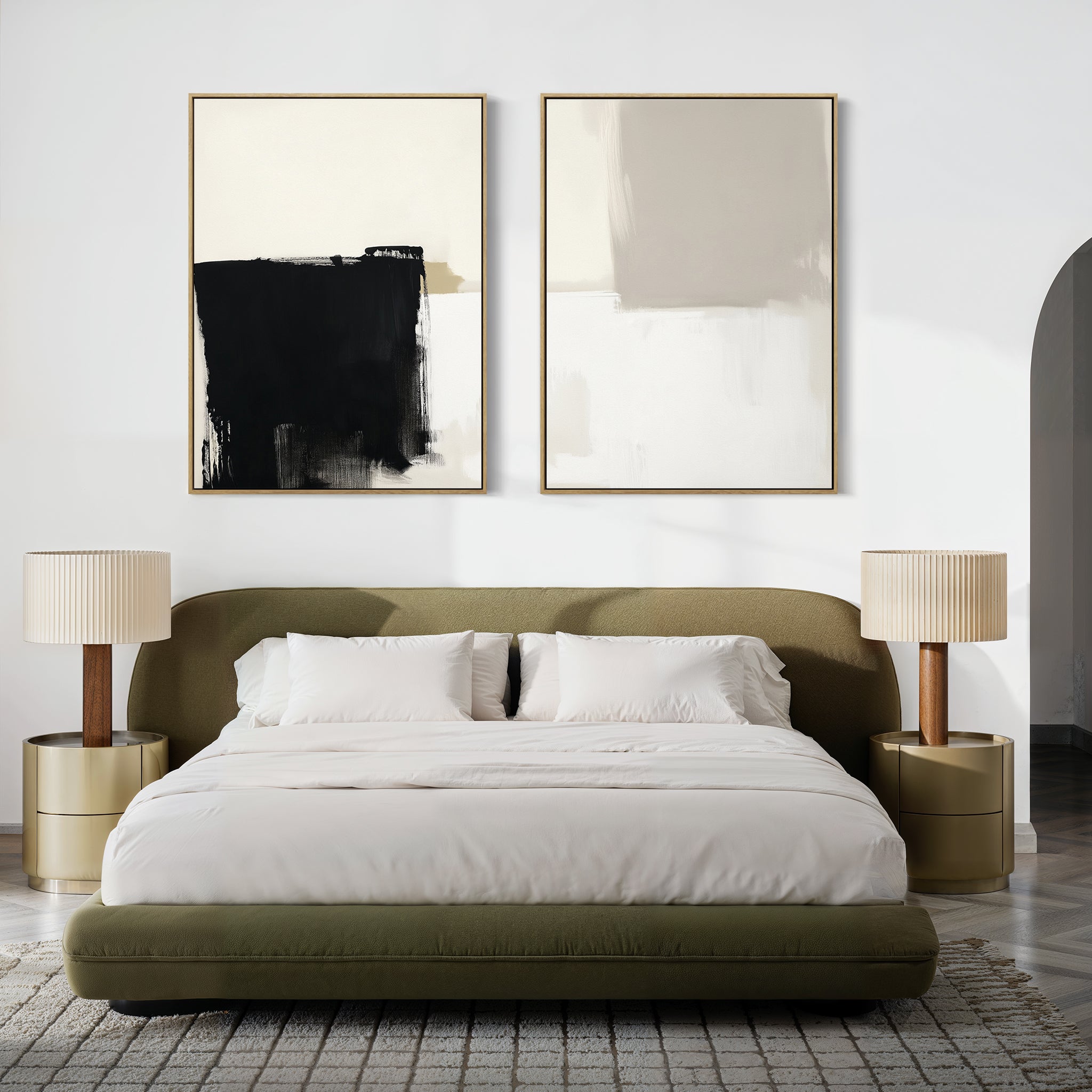 A modern bedroom with a green upholstered bed, white bedding, two gold nightstands with beige lamps, and Bold Division - Set Of 2 Nordic Park art prints in black, white, and beige tones hanging above the bed.
