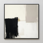 The Bold Division Canvas Art - Square features bold black and beige blocks, blended white and gray areas, and geometric shapes in a thin black frame—a minimalist abstract print ideal for modern living rooms with pale walls.