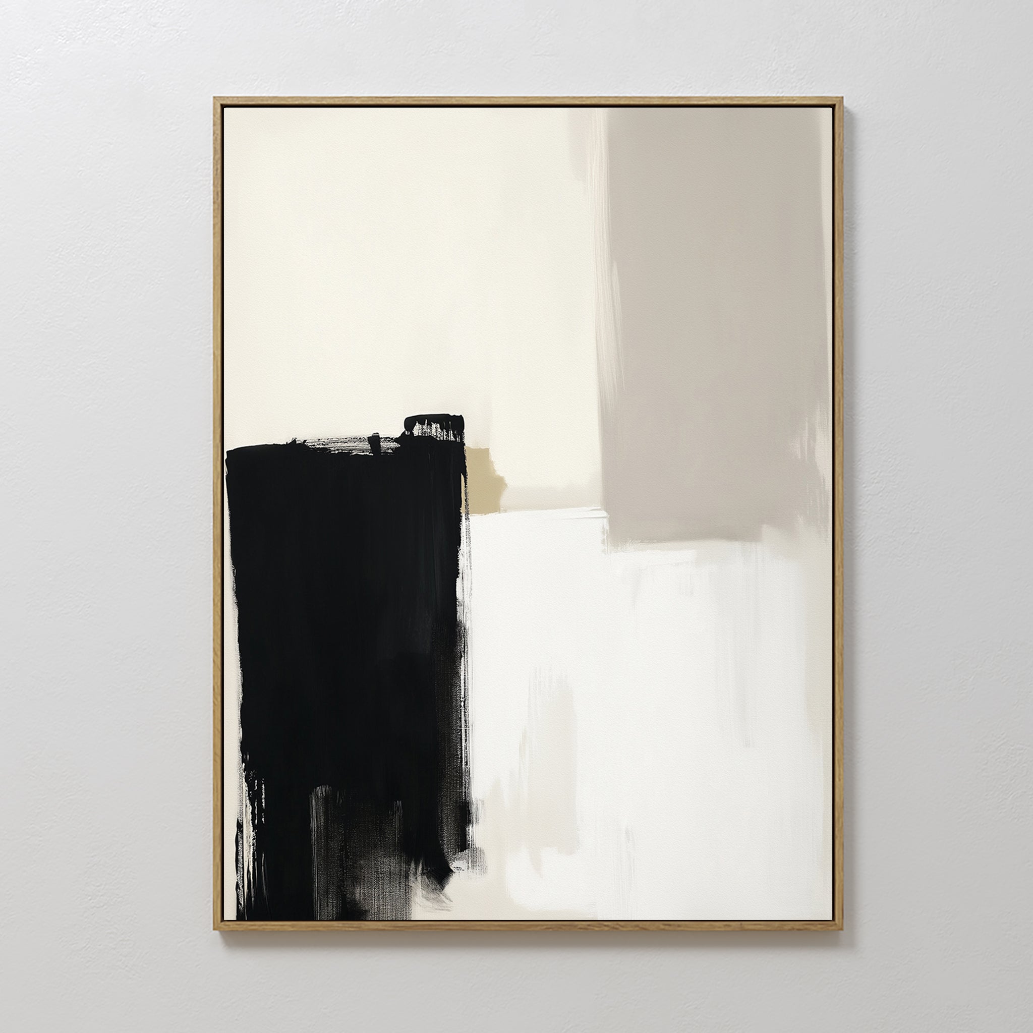 The Bold Division Canvas Art - Vertical features bold black and soft beige rectangles blending into a white backdrop, set in a slim gold frame—ideal as a contemporary accent for minimalist bedrooms or modern living rooms.
