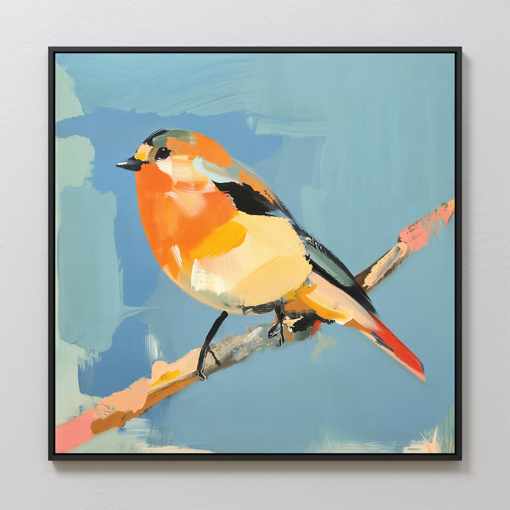 The Bright Songbird Canvas Art - Square features a small bird with orange, yellow, and black feathers on a branch set against a light blue abstract background, beautifully framed in black.