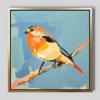 Bright Songbird Canvas Art - Square features a vibrant small songbird with orange, yellow, and white feathers perched on a branch against a blue abstract background in a gold frame—an eye-catching modern wall art piece for any space.