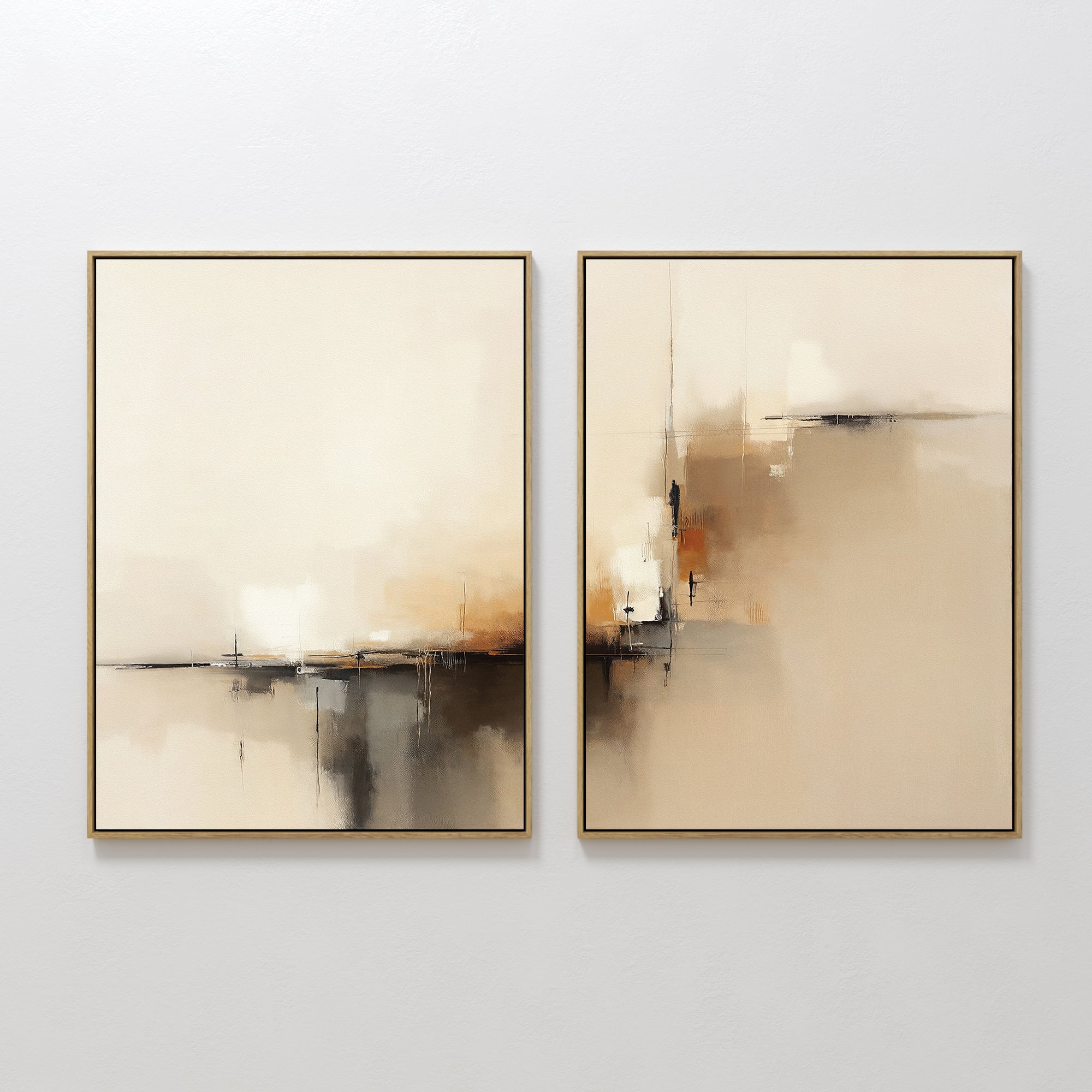 Burnt Sienna Convergence - Set Of 2 features abstract prints in cream, beige, brown, and black. Each framed piece’s soft brushstrokes evoke modern elegance, creating striking wall art when displayed side by side on a white wall.