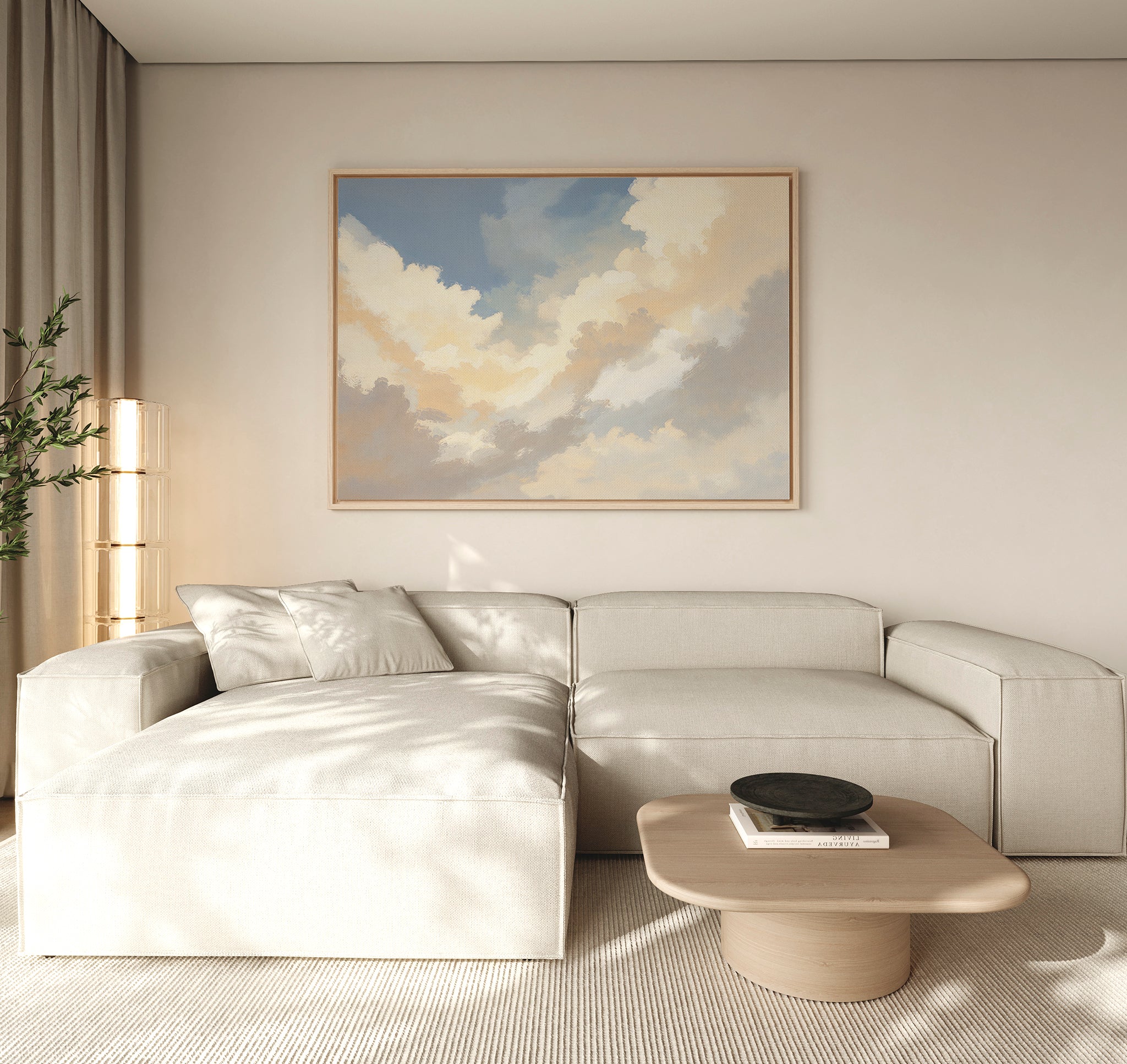 A modern, minimalist living room with a light beige sectional sofa, a low wooden coffee table with books and a bowl, Celestial Embrace Canvas Art - Horizontal on the wall, beige curtains, and a potted plant in the corner.