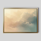The Celestial Veil Canvas Art - Horizontal features pastel clouds in cream, peach, and blue on a light sky. Set in a gold frame with a black inner border, it evokes Nordic Park’s serenity against a plain gray background.
