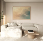 A modern living room with a light beige sectional sofa, a wooden coffee table with a black bowl, a tall plant, and the Celestial Veil Canvas Art - Horizontal displayed above the couch.