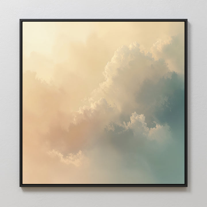 The Celestial Veil Canvas Art - Square features soft, fluffy clouds in cream, peach, and blue hues under champagne light on a pale background, elegantly framed and displayed on a plain white wall.