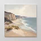The Chalk Shores Canvas Art - Square features a sandy beach with grassy dunes, gentle waves, and tall white cliffs under a partly cloudy sky—ideal serene wall art for a Nordic Park-inspired space.