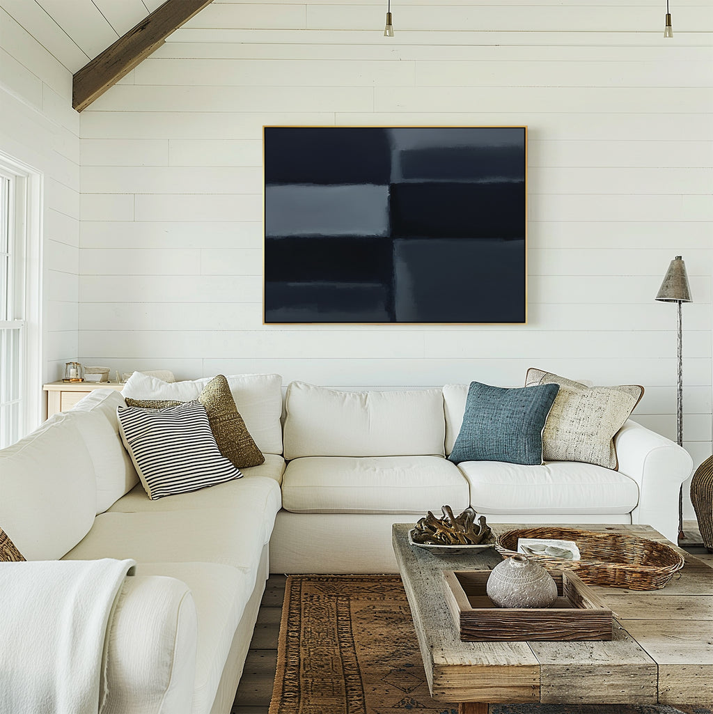 A bright living room with white shiplap walls, a large white sectional sofa, rustic wood coffee table, and modern decor featuring the Charcoal Blocks Canvas Art - Horizontal hung above the sofa.