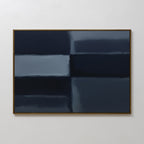 Charcoal Blocks Canvas Art - Horizontal features abstract geometric shapes in dark blue and black with softly blended edges and a slim gold frame, making it ideal minimalist decor for a modern living room on a white wall.