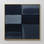 Charcoal Blocks Canvas Art - Square features dark blue and black rectangles with blurred edges in a grid, set in a slim light wood frame—ideal modern wall decor for white walls.
