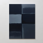 Charcoal Blocks Canvas Art - Vertical displays large, blurred rectangles in dark blue and gray tones arranged in a grid on a white wall. This geometric art print with soft edges suits modern home decor or minimalist wall art spaces.