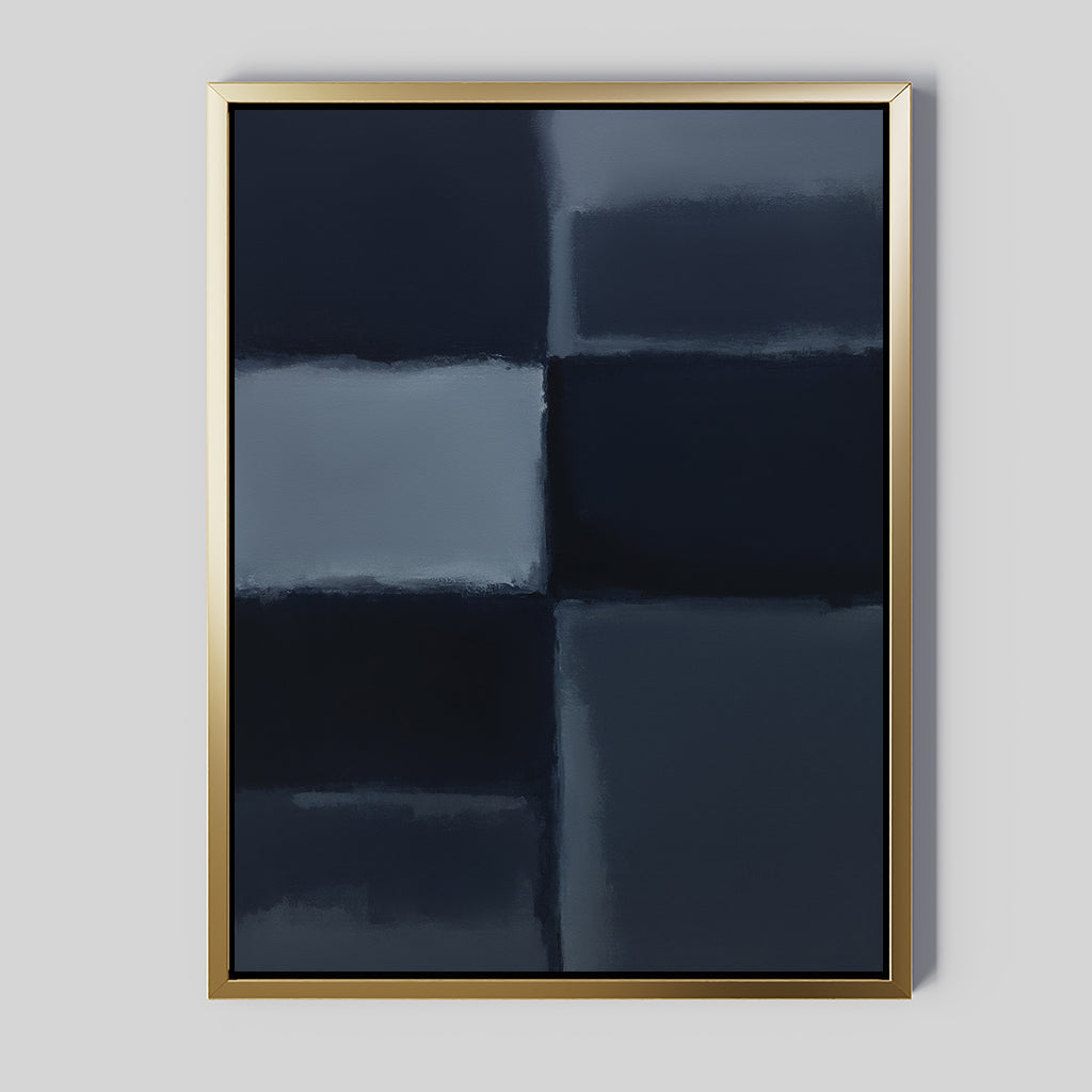 The Charcoal Blocks Canvas Art - Vertical features four dark blue and black rectangles with blurred edges, set on a light gray wall. A metallic gold frame adds elegance to this minimalist wall art piece.