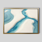 Coastal Dreams Canvas Art - Horizontal features a winding blue river between soft beige sandbanks with gold framing on a light gray background. This serene wall art brings fluid shapes and calming colors to any tranquil, coastal-inspired space.