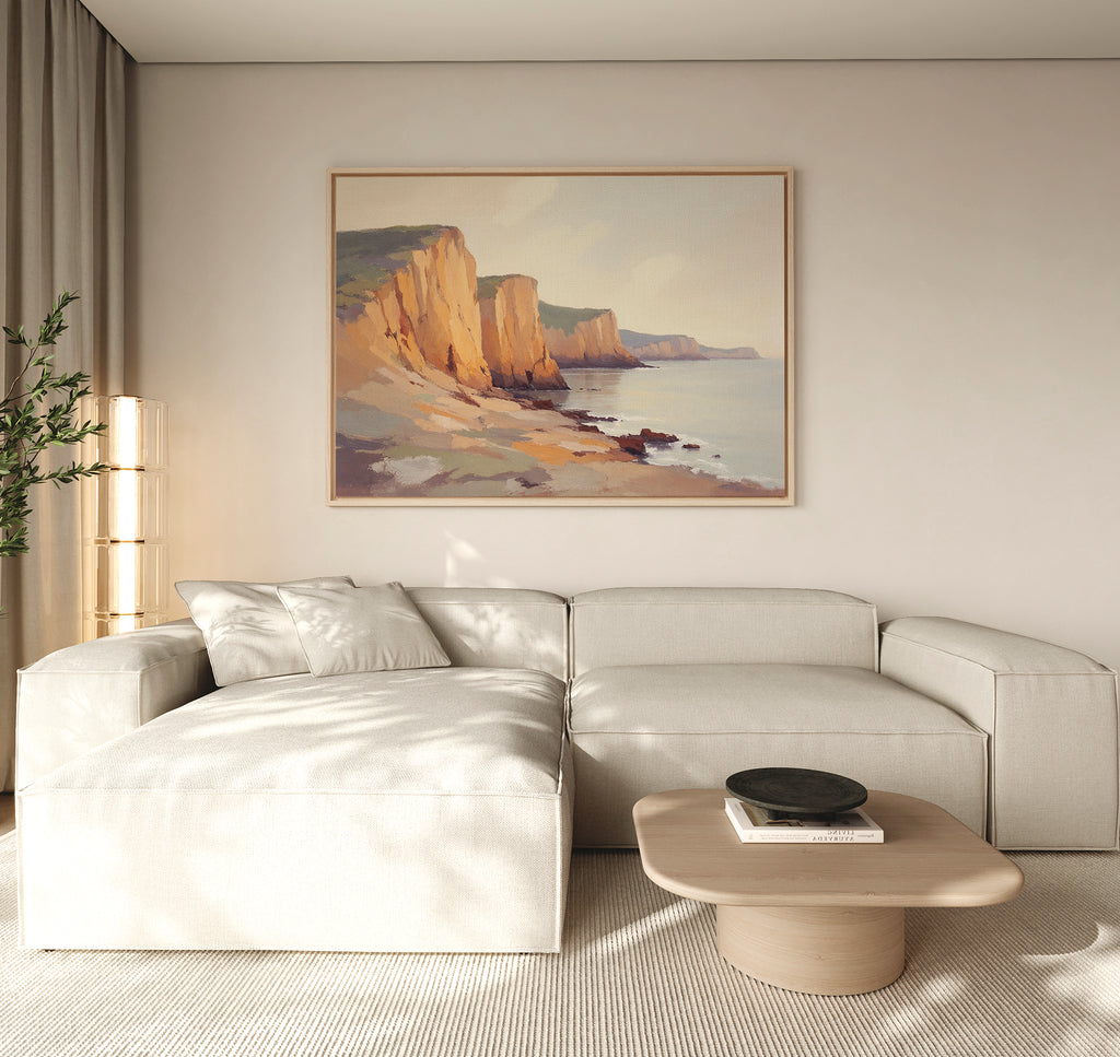 A living room featuring the Coastal Grandeur Canvas Art - Horizontal on the wall.