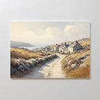 Bring serene charm to your space with the Coastal Haven Canvas Art - Horizontal, featuring a quiet country road winding past cottages and golden fields toward a distant blue sea under a soft sky—a perfect rustic landscape.