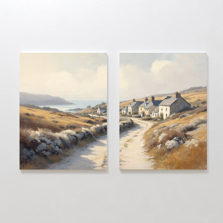 The Coastal Haven - Set of 2 features canvas prints of scenic golden fields: the left print’s path leads to the sea, while the right highlights white cottages and a bright sky along a rustic trail.
