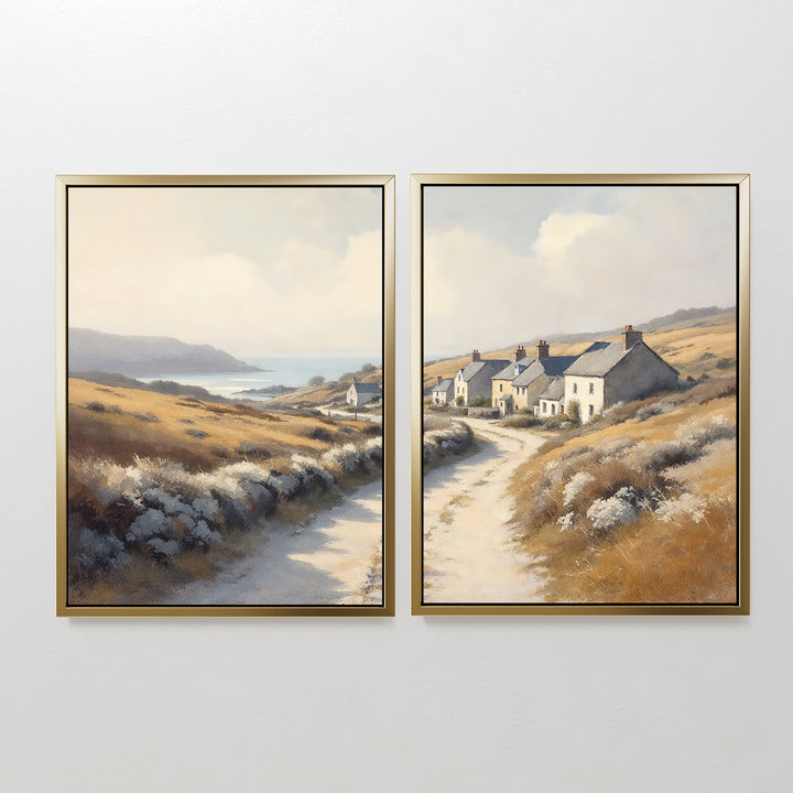 The "Coastal Haven - Set of 2" features two framed landscape prints: one portrays winding roads and grassy hills leading to the sea, while the other depicts cottages under a bright sky, capturing rustic coastal charm.