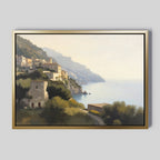 The "Italian Reverie Canvas Art - Horizontal" features a framed Mediterranean coastal village on a hillside, with sunlit buildings above the tranquil sea and lush greenery under a hazy golden sky.
