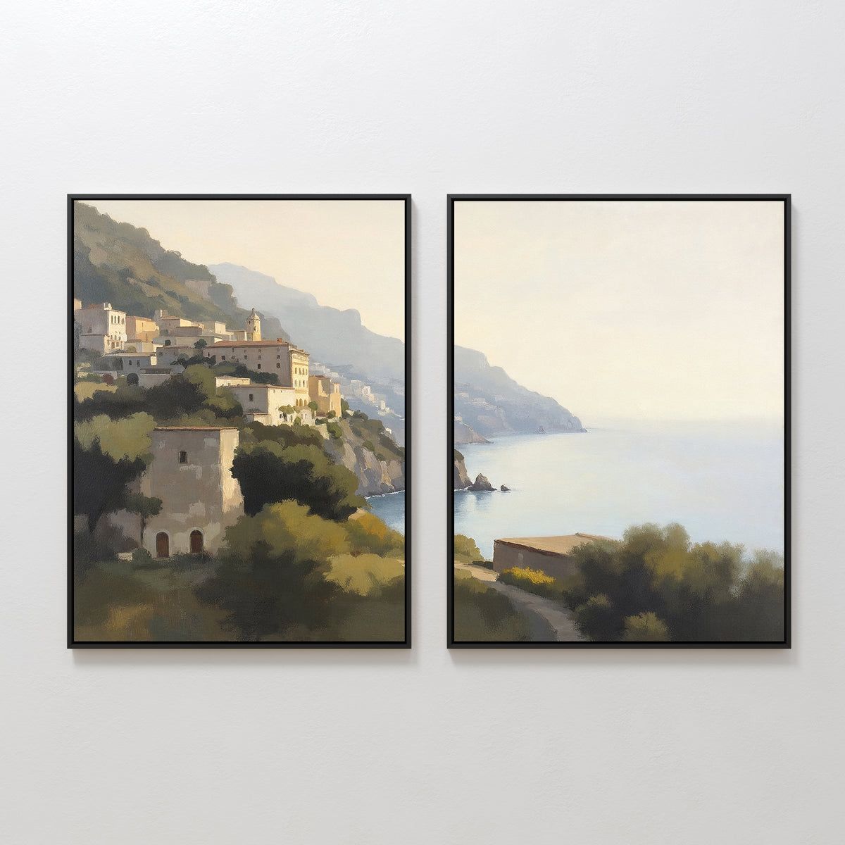 Italian Reverie - Set of 2 features framed paintings of a coastal village atop cliffs over a calm sea. Sunlit buildings, greenery, and misty mountains make elegant wall art and home decor under a pale sky.