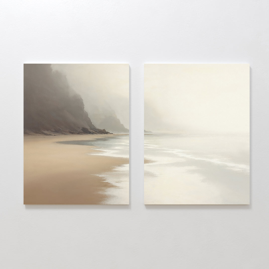 The "Coastal Silence - Set of 2" features square canvas prints with a serene beach scene—soft waves, sandy shore, and misty cliffs fading under a pale sky. This minimalist wall art in neutral tones brings a calming Nordic Park vibe to your space.