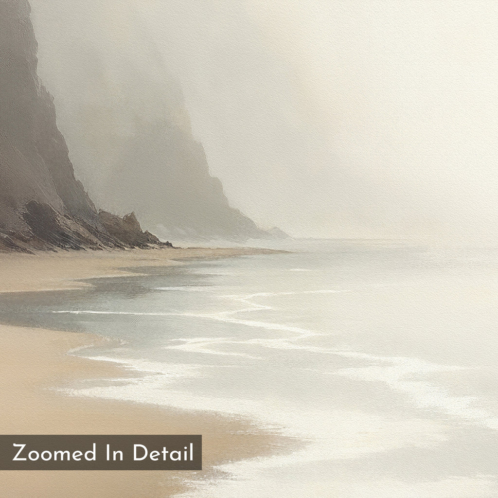 A misty beach scene with gentle waves and rugged cliffs in soft, natural tones. “Zoomed In Detail” is in the bottom left corner. The Coastal Silence Canvas Art - Square is perfect for adding a serene coastal vibe to any space.