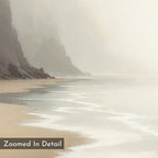 A misty beach scene with gentle waves and rugged cliffs in soft, natural tones. “Zoomed In Detail” is in the bottom left corner. The Coastal Silence Canvas Art - Square is perfect for adding a serene coastal vibe to any space.