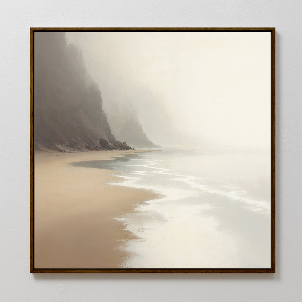 Coastal Silence Canvas Art - Square features a framed coastal scene with gentle waves, foggy cliffs, and a natural beige and gray palette for a peaceful, serene ambiance.