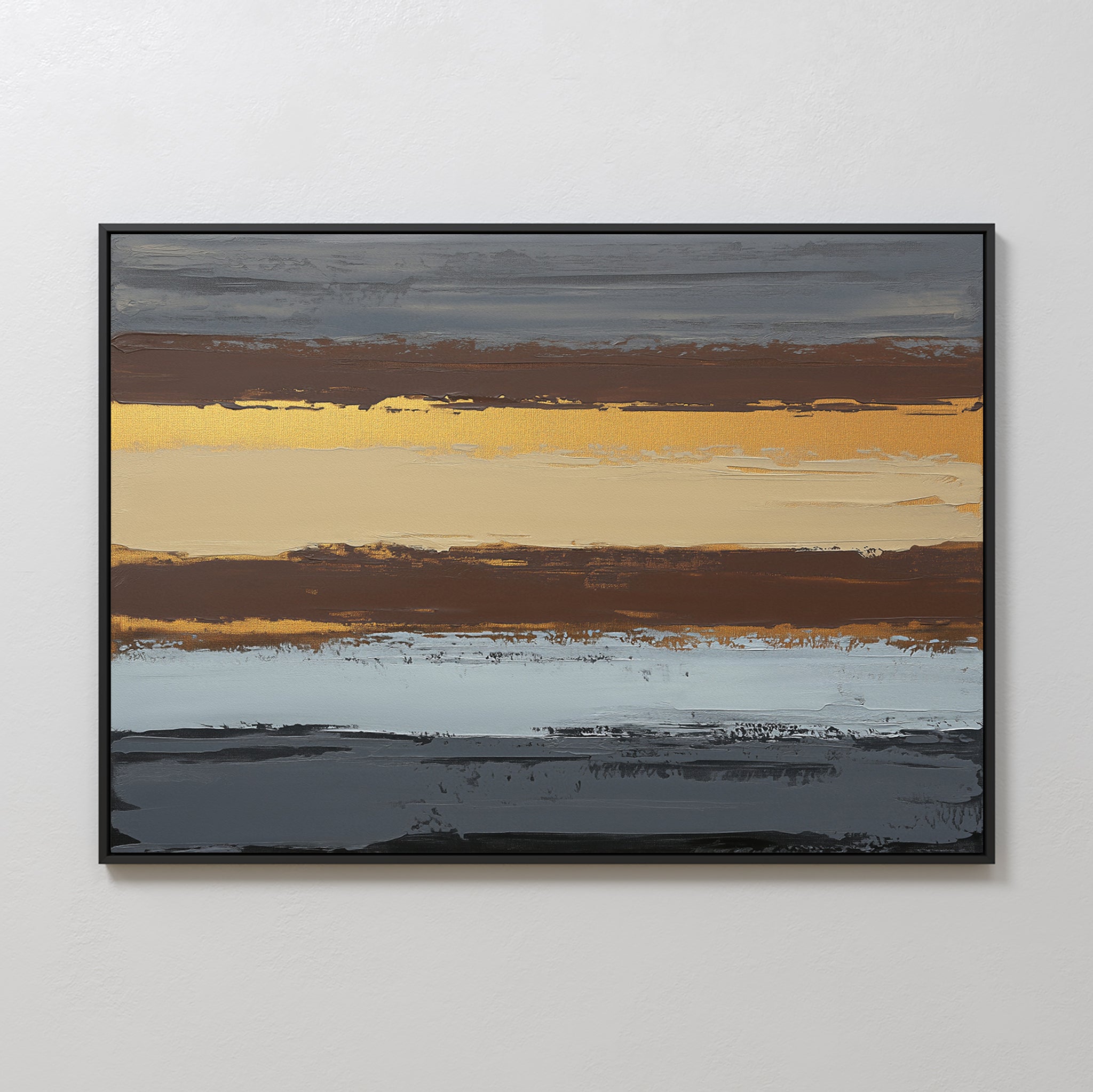 The Coastal Strata Canvas Art - Horizontal features earthy sophistication with horizontal stripes in brown, gold, beige, blue, and gray. Textured brushstrokes add depth to this contemporary print, elegantly framed in black on a white wall.